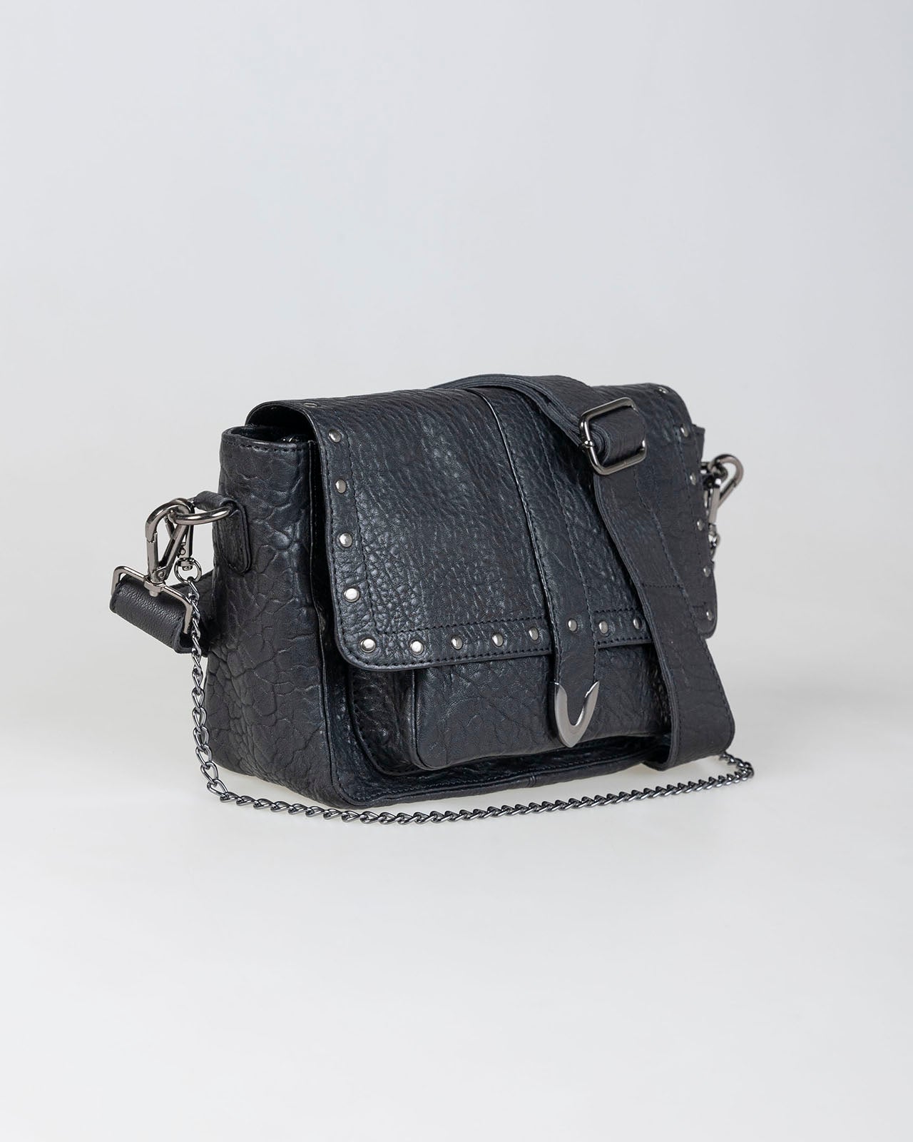 Bolso piel con tachas