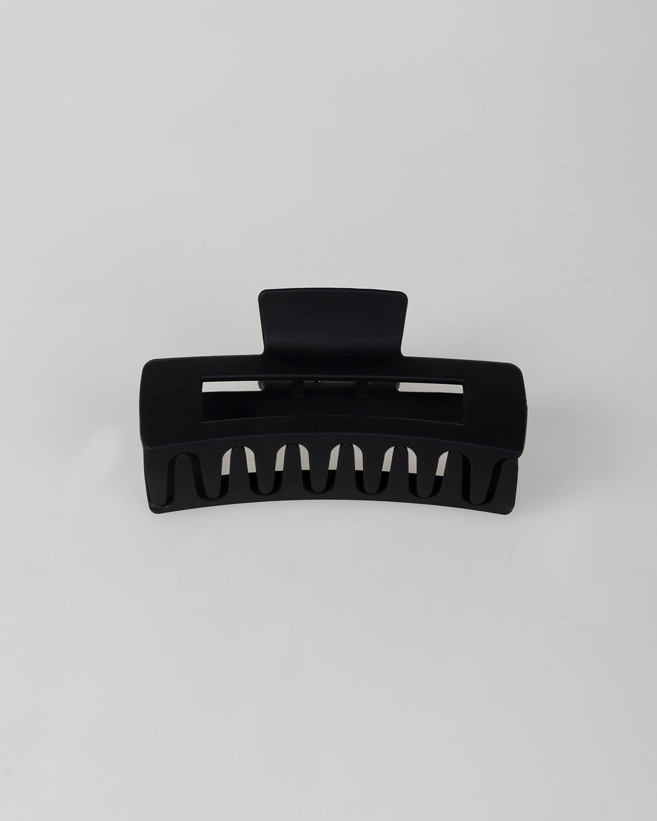 Pinza pelo negra